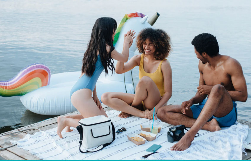 photo of girls and a guy with a unicorn 